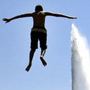 boy diving into water